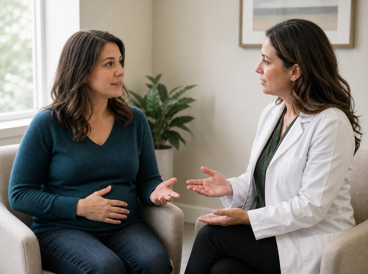 A mother discussing personalized mommy makeover options directly with a female plastic surgeon
